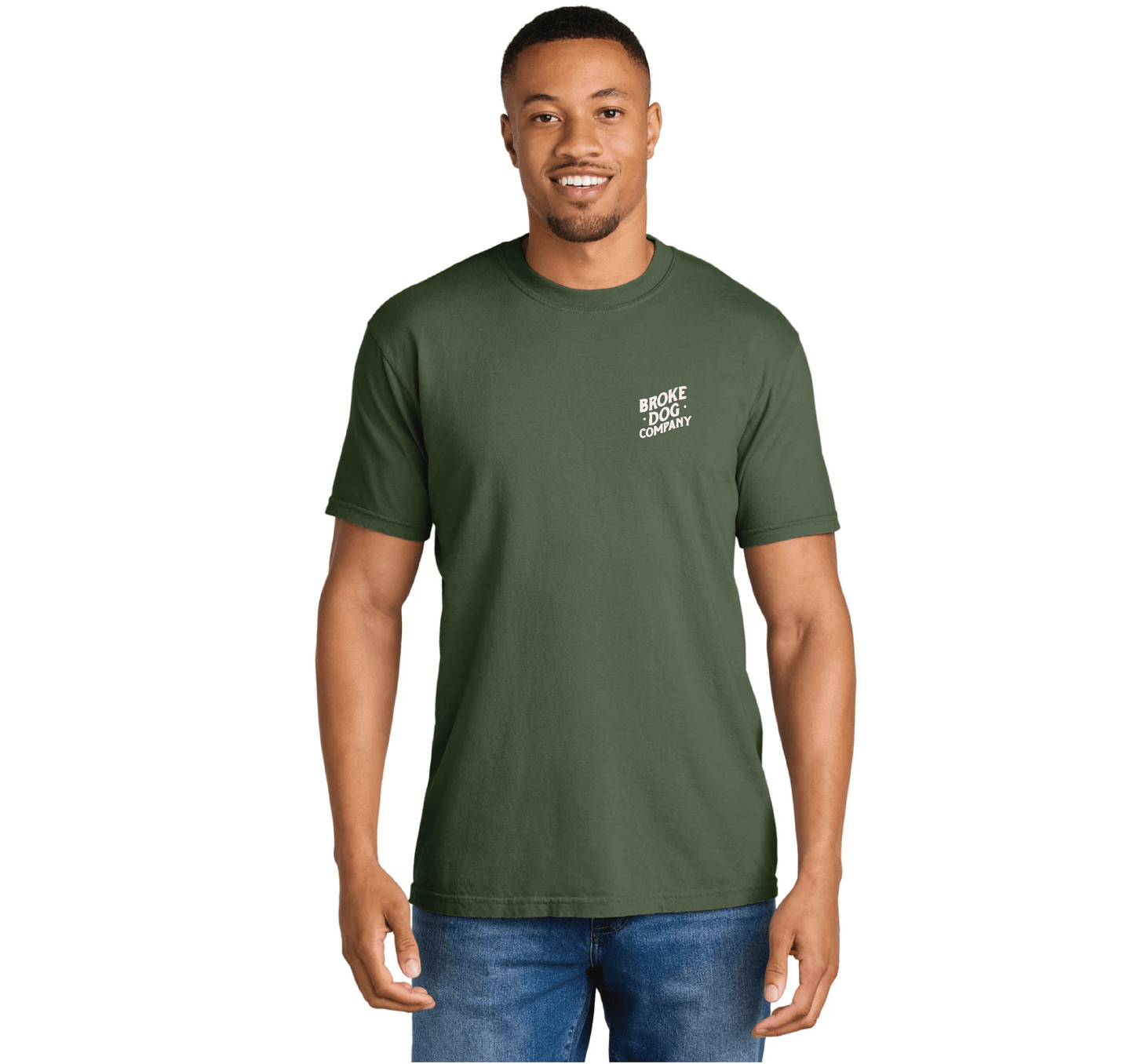 Man wearing a green 'Broke Dog Co.' t-shirt with a relaxed fit, showcasing a playful dog lover theme.