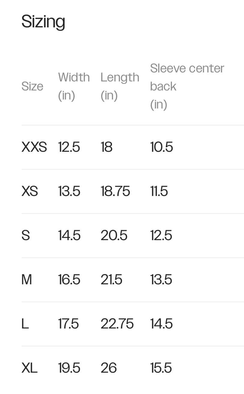 Sizing chart for Not All Heroes Wear Capes Washed Denim shirt showing dimensions for various sizes.