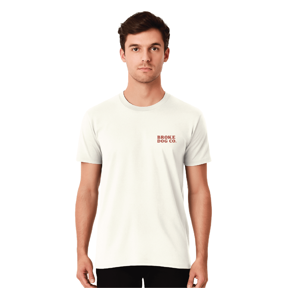 Model wearing white 'Here for the Glizzies' Summer Fun T-Shirt by Broke Dog Co., perfect for dog lovers.